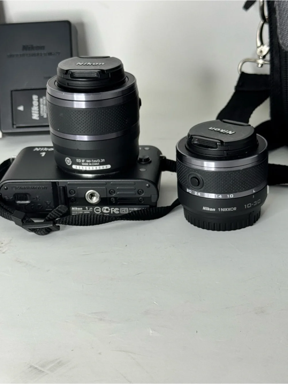 Nikon 1 J1 Compact Mirrorless Camera Black two lenses batterycharger memory card